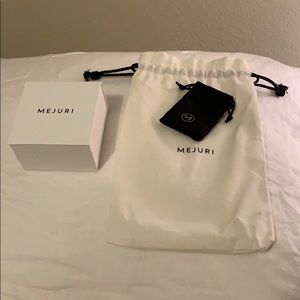 Mejuri box and cloth bags